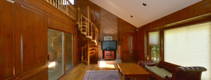 Featured image of living room with staircase.
